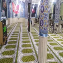 فرش سجاده طرح سماوات سبز مسجد امام حسن مجتبی میرسرا فومن از زاویه کنار